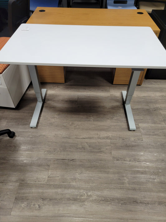 Pre-owned sit to stand desk
