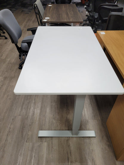 Pre-owned sit to stand desk